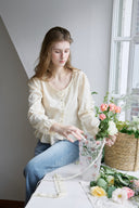 Noteny Round-Neck Frill Blouse