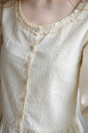 Noteny Round-Neck Frill Blouse