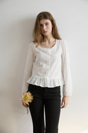 Noteny Round-Neck Frill Blouse